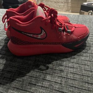 Kids Red and Black Nike Kyrie size 3.5Y